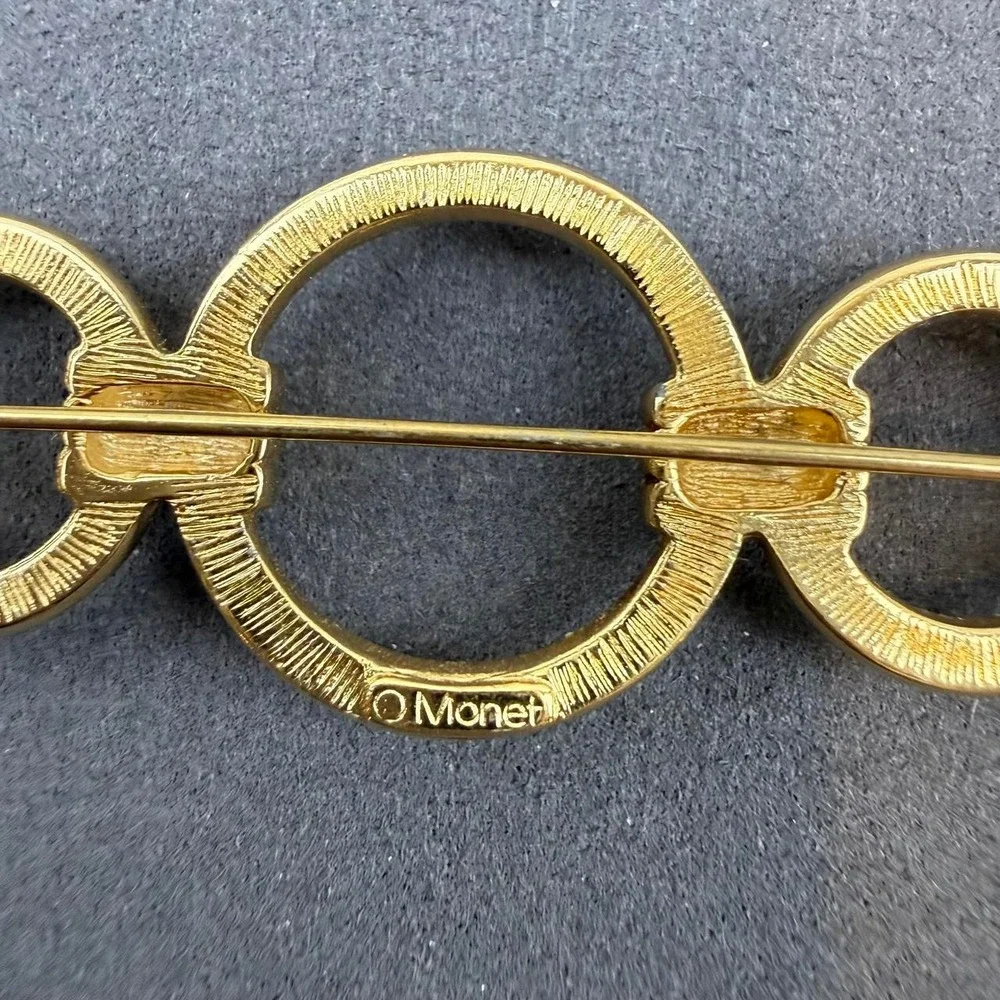 Monet Vintage Geometric Brooch Gold Tone Interlocking Circle Bar Design